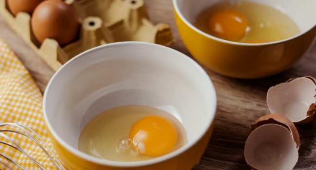cracked eggs in a bowl
